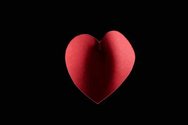 Top view of paper heart with shadow isolated on black — Stock Photo