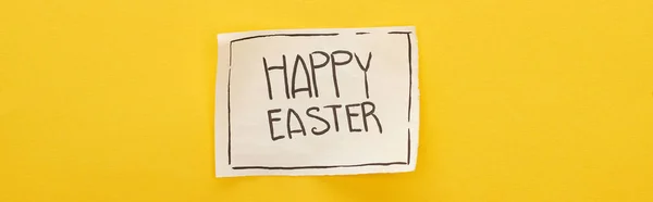 Top view of greeting card with happy Easter lettering on yellow colorful background, panoramic shot — Stock Photo