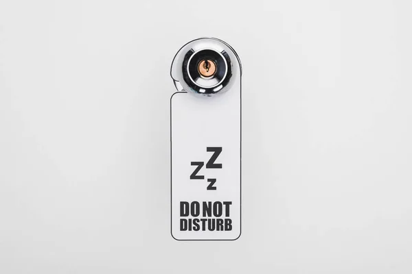 Do no disturb sign on handle with lock on white background — Stock Photo