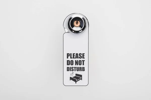 Please do no disturb sign on handle with lock on white background — Stock Photo