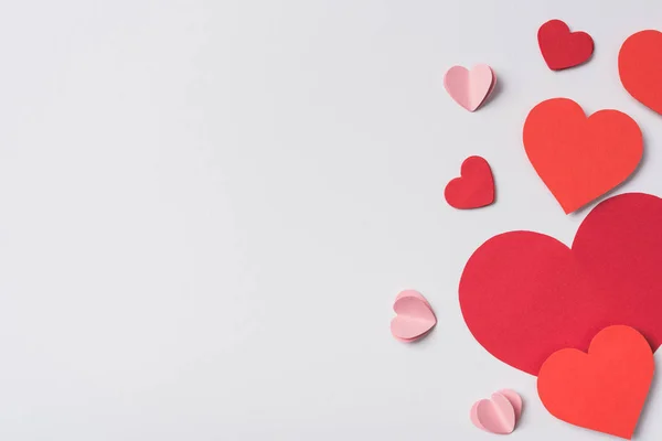 Top view of red hearts on white background — Stock Photo