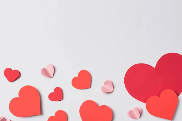 Top view of red hearts on white background — Stock Photo