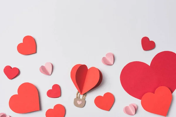 Top view of red hearts with lock on white background — Stock Photo