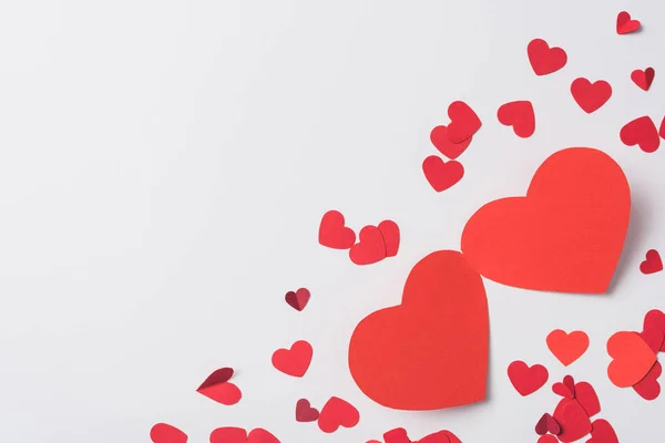 Top view of red hearts on white background — Stock Photo