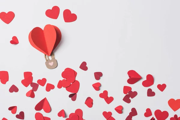 Top view of red heart with padlock among hearts on white background — Stock Photo