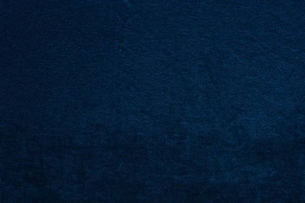 Vista superior del fondo texturizado de terciopelo azul - foto de stock