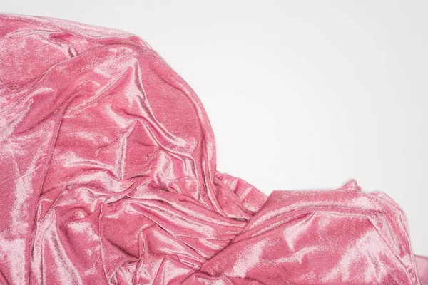 Vista superior de pano de veludo rosa isolado em branco — Fotografia de Stock