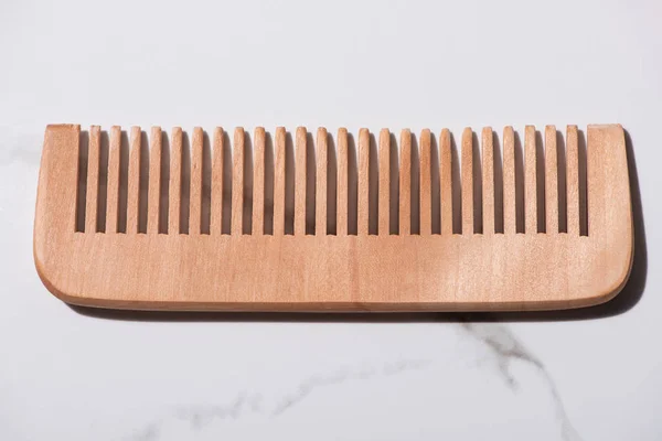 Close up of wooden comb on white background, zero waste concept — Stock Photo