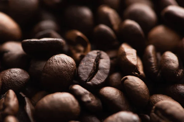 Close up view of fresh roasted coffee beans background — Stock Photo