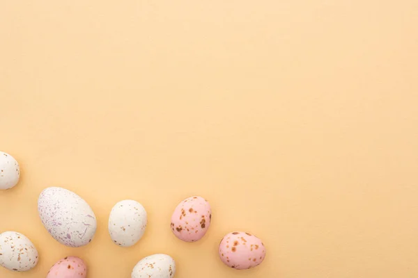 Top view of quail eggs on beige background — Stock Photo