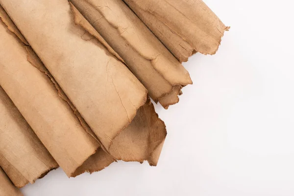 Top view of vintage rolled aged paper isolated on white — Stock Photo