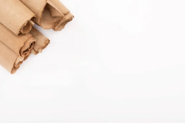 Top view of vintage rolled aged paper isolated on white — Stock Photo