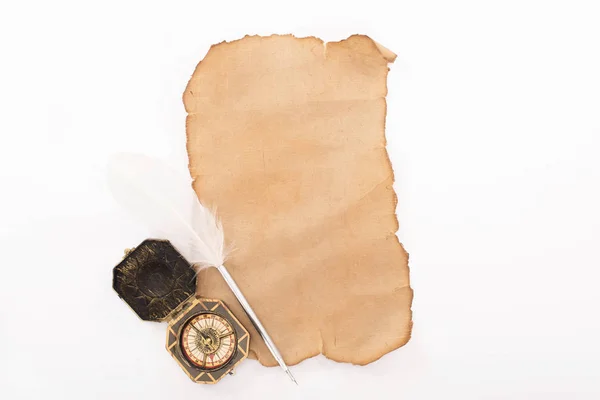 Top view of vintage paper, compass and quill isolated on white — Stock Photo