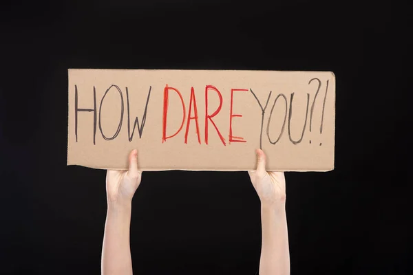 Cropped view of woman holding placard with how dare you lettering isolated on black, global warming concept — Stock Photo