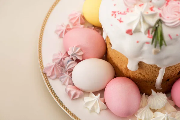 Close up view of tasty fresh Easter cake with painted eggs and meringue on plate — Stock Photo