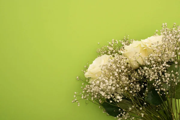 Top view of fresh bouquet of flowers isolated on green — Stock Photo