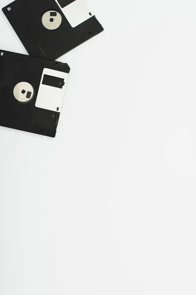 Top view of two floppy disks on white background — Stock Photo