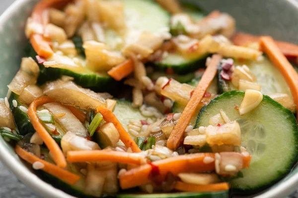 Close up of tasty korean cucumber kimchi in bowl — Stock Photo