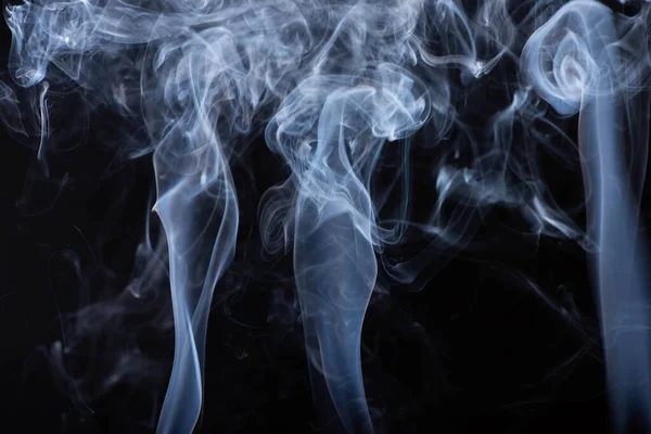 White flowing smoke cloud on black background — Stock Photo