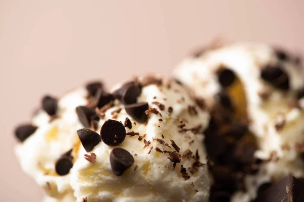 Selective focus of ice cream with chocolate chips on beige background — Stock Photo