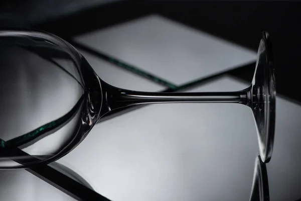Close up view of mirror pieces and glass in dark — Stock Photo