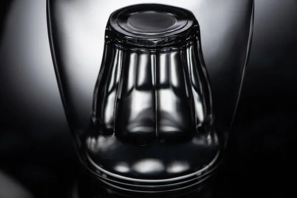 Close up view of shot glass in wine glass in dark — Stock Photo