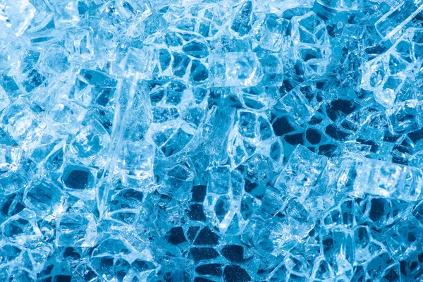 Vue du dessus du fond texturé abstrait de glace bleue — Photo de stock