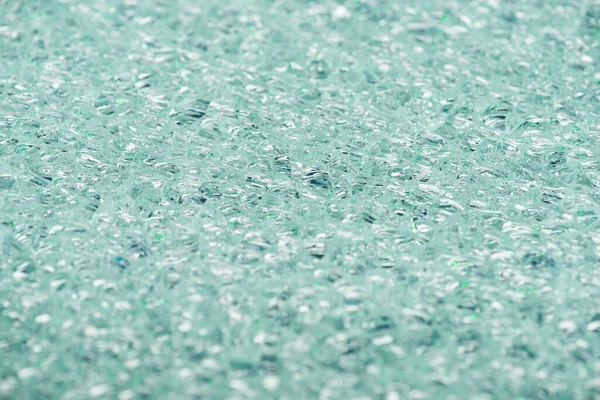 Vista de cerca del fondo abstracto de textura de hielo transparente turquesa - foto de stock