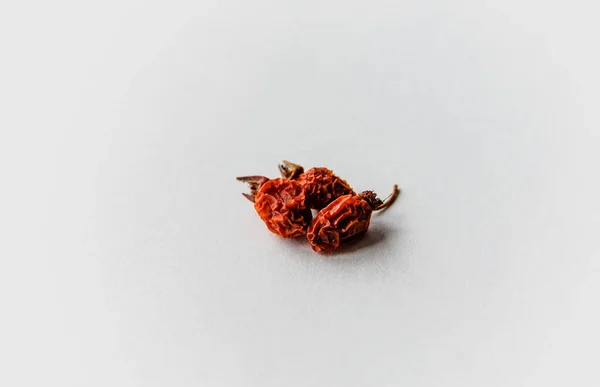 Three Dried Rosehip Berries Folded Together White Background — Stock Photo, Image