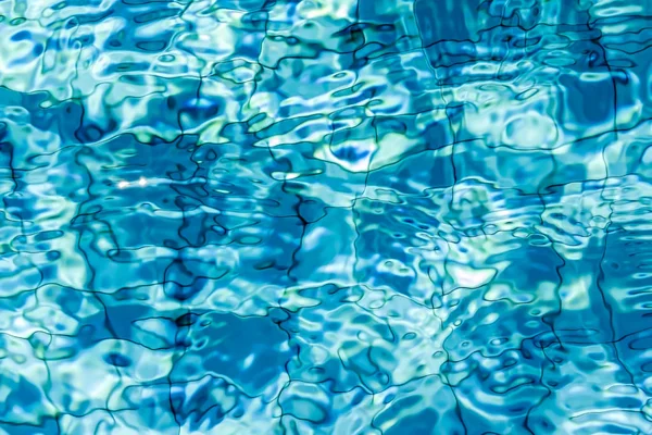 Air biru pada tekstur latar kolam Stok Foto