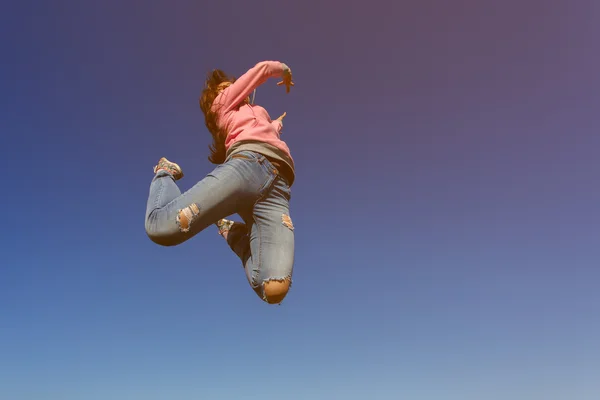 Young beautiful woman dancer jumping — Stock Photo, Image
