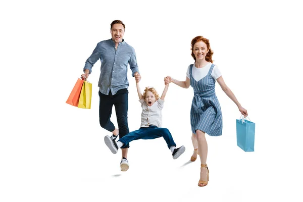 Young family shopping together — Stock Photo