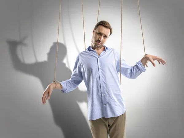 Man on manipulating ropes — Stock Photo
