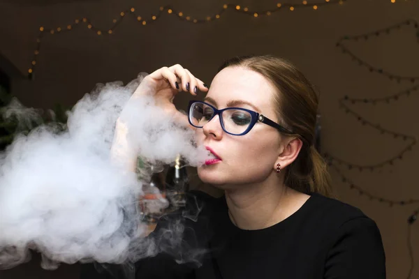 Vape girl with red lips in black dress — Stock Photo, Image