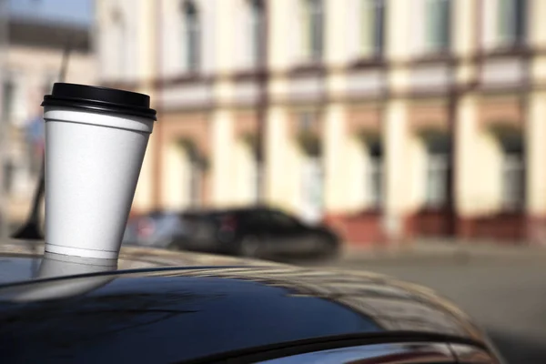 paper cup with coffee to go (space for logo)