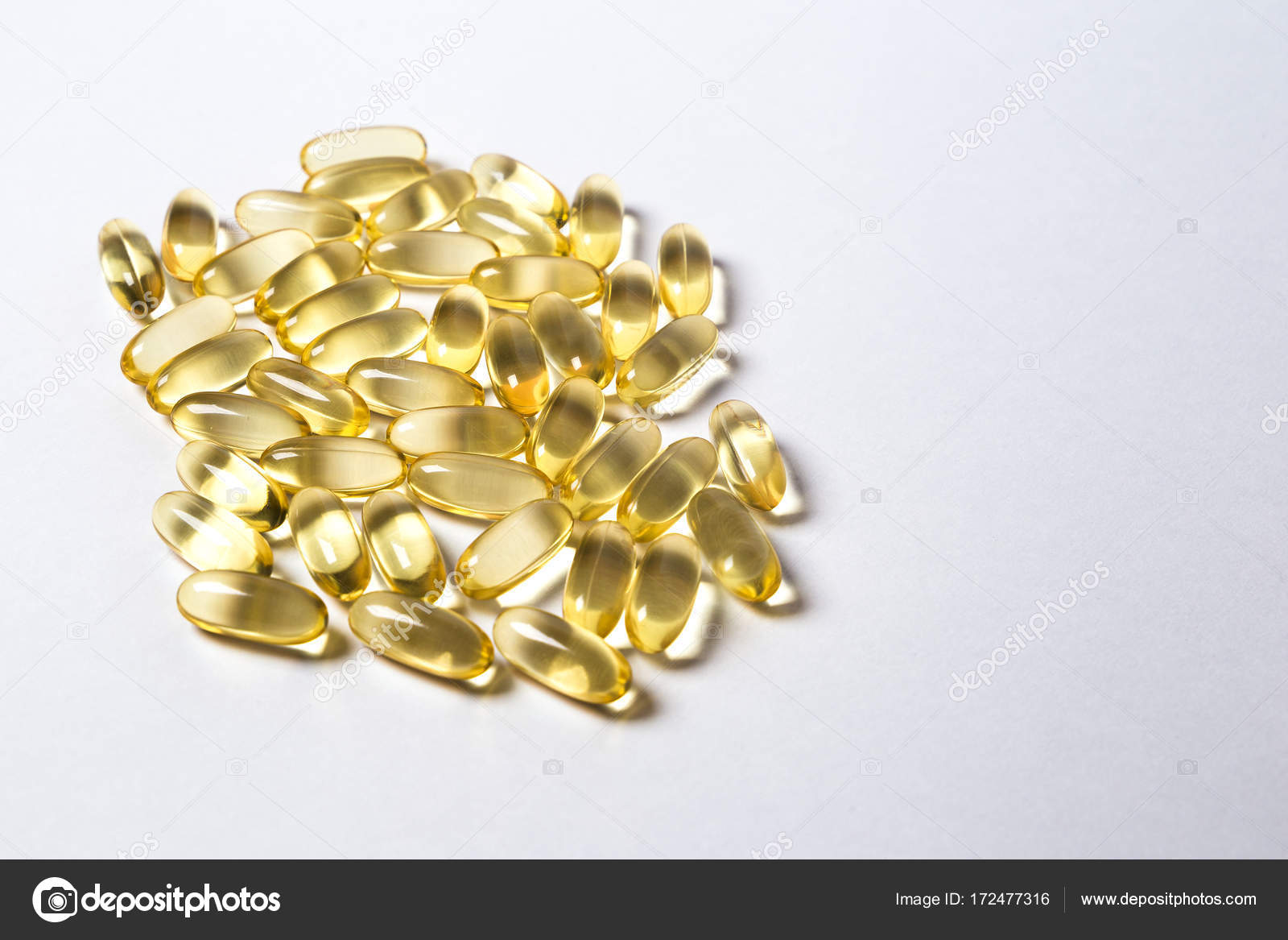 Omega 6 conjugated linoleic acid (CLA) in capsules on the white