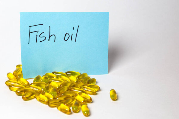 Fish Oil  in capsules isolated on the white background