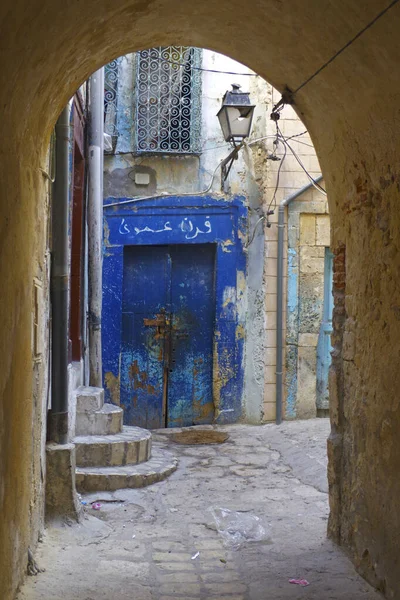old medina door with arabic script