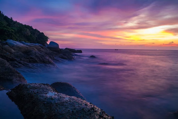 Sunset on tropical beach Stock Photo