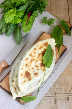 Ermenilerin Artsakh Zhingyalov üzerinden geleneksel yemek şapka yapmak Baker gözleme otlar ile doldurulmuş bir türüdür.