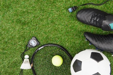 Sport equipment on grass  clipart