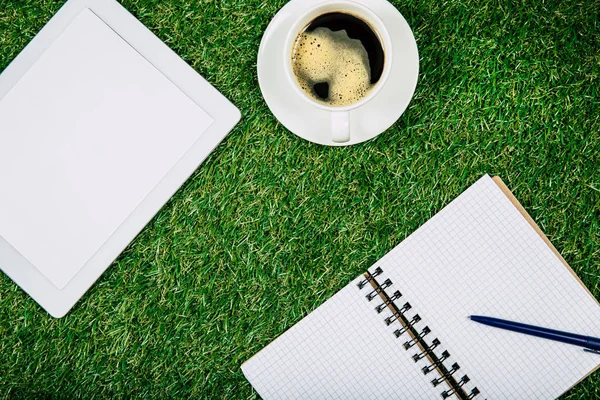 Tablet and blank notebook — Stock Photo, Image