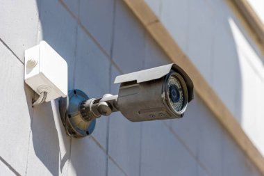 security camera on wall clipart