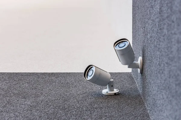 Security camera on wall — Stock Photo, Image