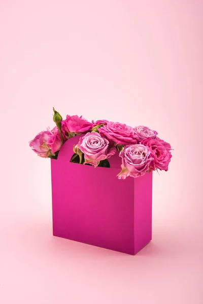 Pink roses in paper box — Stock Photo, Image