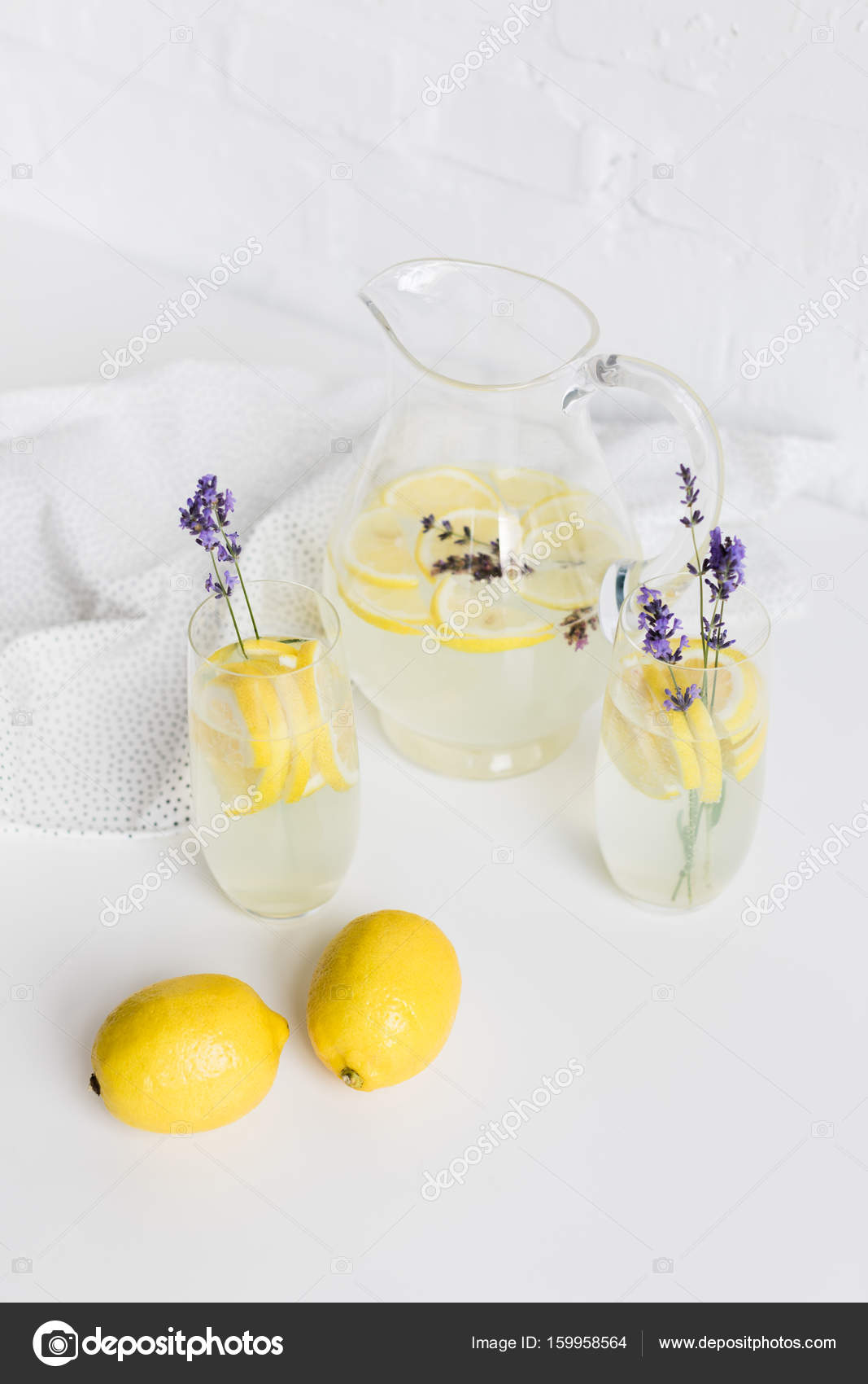 Lemonade in glasses and jar — Stock Photo © AntonMatyukha 159958564