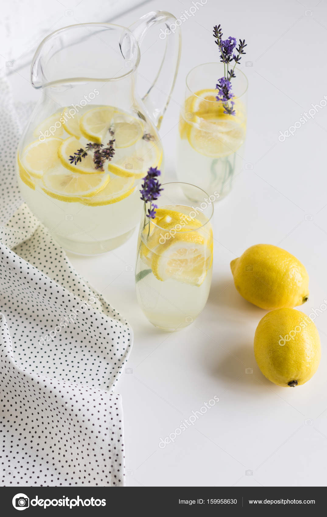 Lemonade in glasses and jar — Stock Photo © AntonMatyukha 159958630