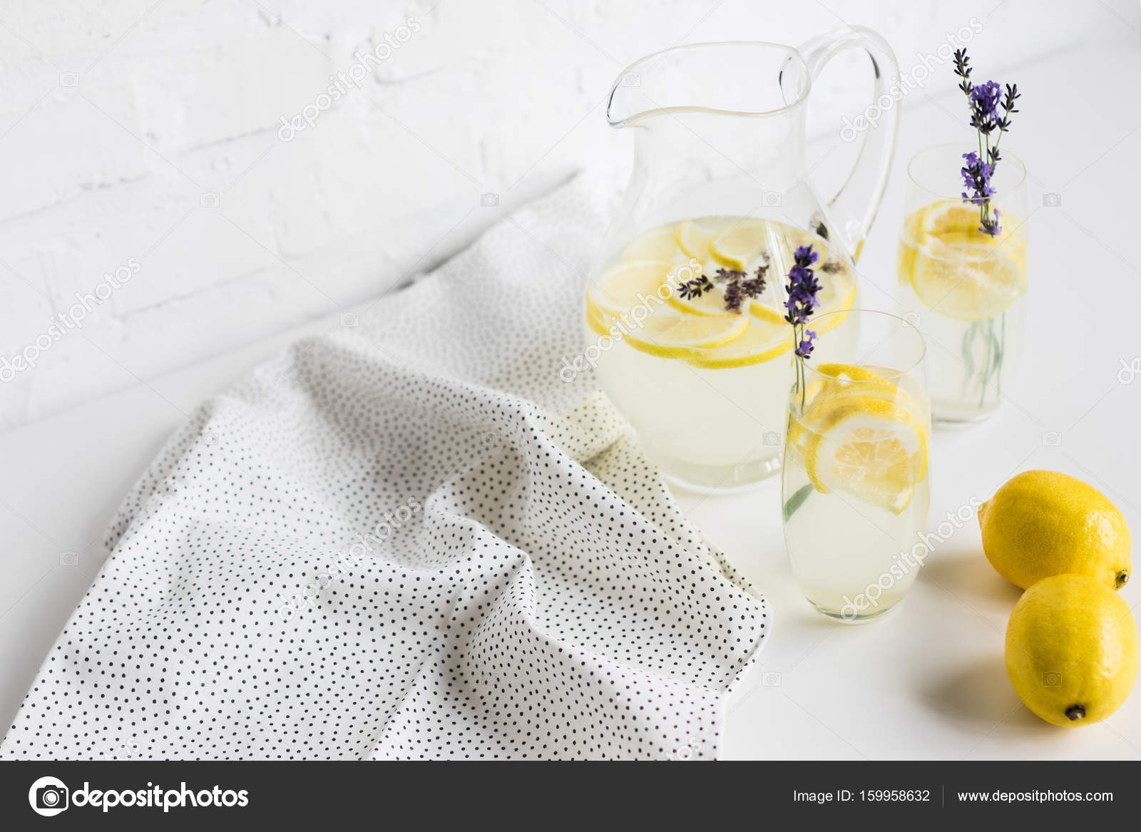 Lemonade in glasses and jar — Stock Photo © AntonMatyukha 159958632