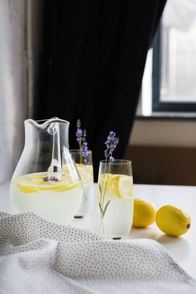 lemonade in glasses and jar