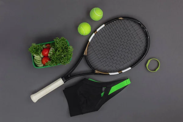 Tennisutrustning och sportkläder — Stockfoto